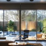 a modern, sleek home office featuring a detailed infographic on the costs of house extensions displayed prominently on a digital screen, surrounded by contemporary furniture and architectural plans, all illuminated by warm, ambient lighting.